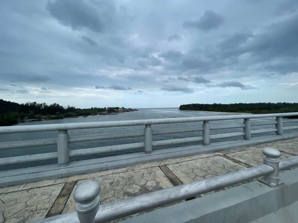 view from koh lanta bridge showing forest and ocean