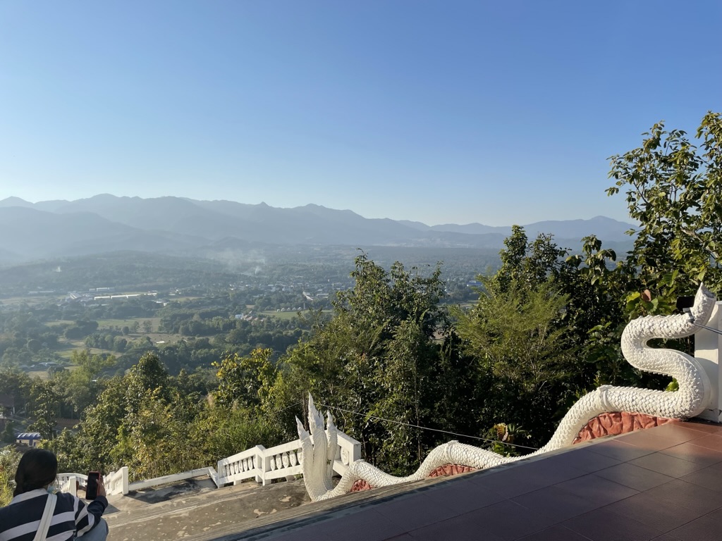 Top 10 Scenic Motorbike Routes Around Chiang Mai Sunset over Pai town in Thailand, Mae Hong Son. View over mountains. Road trip motorbike