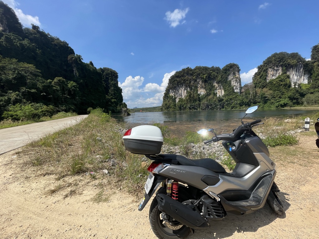 Khao Sok National Park: A Must-Visit Destination from Krabi Motorbike near a lake and cliffs inland Krabi