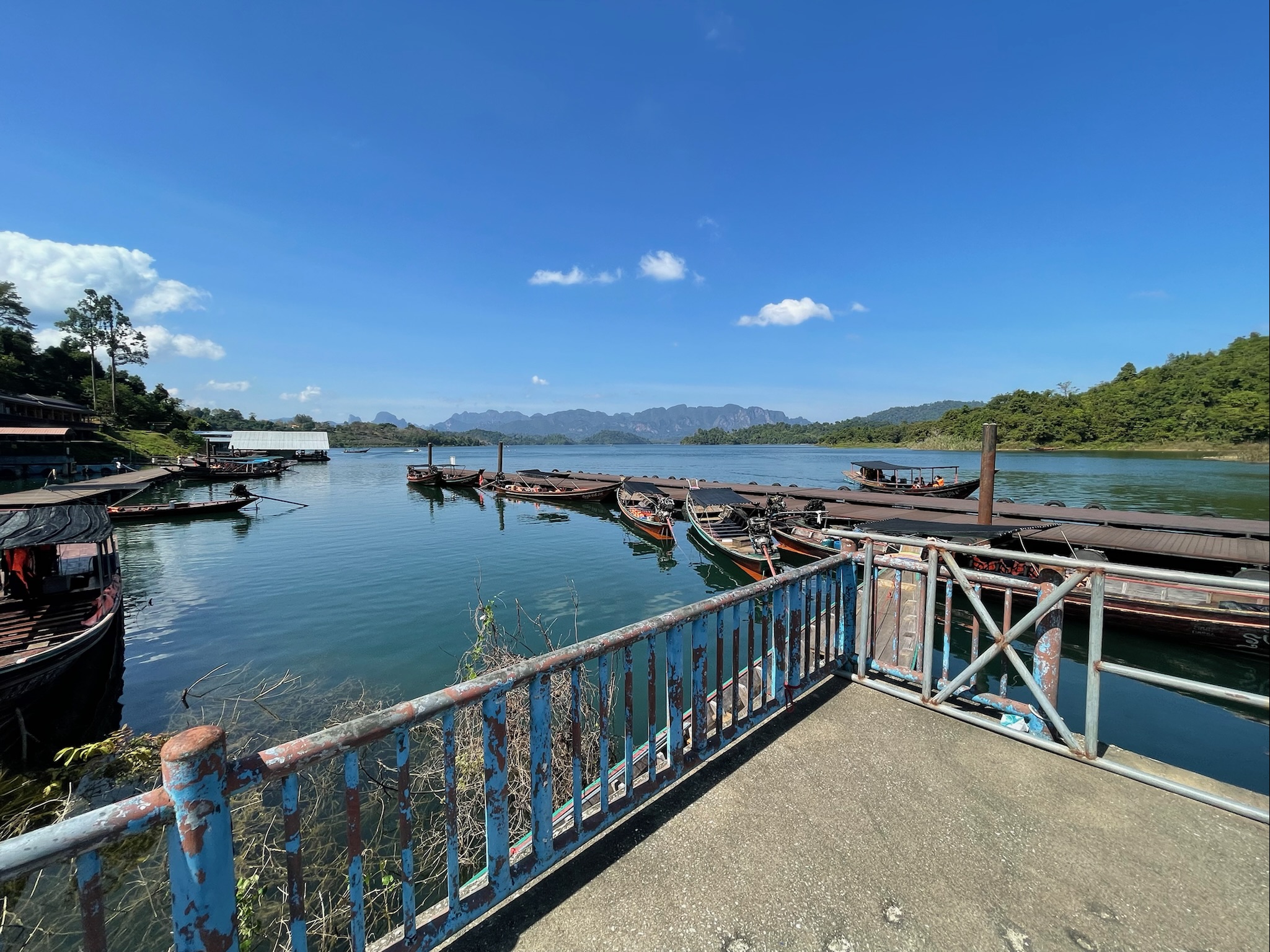 Khao Sok National Park: A Must-Visit Destination from Krabi Boats in Khao Sok National Park. Looking out over the lake with winding mountains in the background
