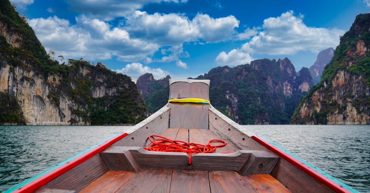 Khao Sok National Park: A Must-Visit Destination from Krabi A peaceful boat ride through the scenic limestone cliffs of Khao Sok National Park, Thailand.