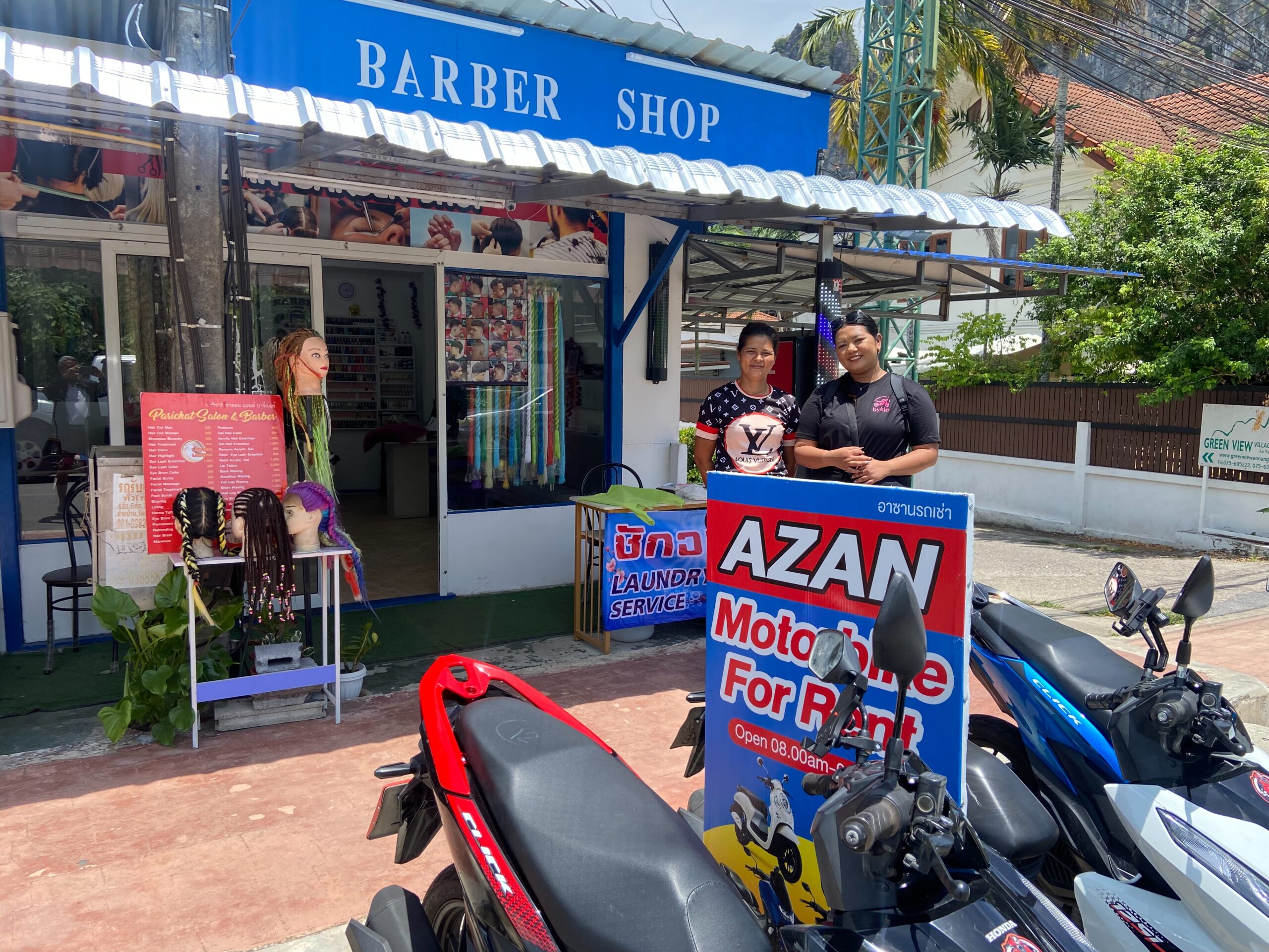 Azan Motorbike Joins Byklo: Your Reliable Motorbike Rental in Krabi Azan Motorbike, Ao Nang, Krabi. Owner and Byklo Staff standing outside Azan Motorbike shop.