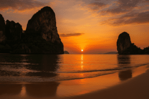 Sunset view of Railay Beach with limestone cliffs in Krabi, Thailand